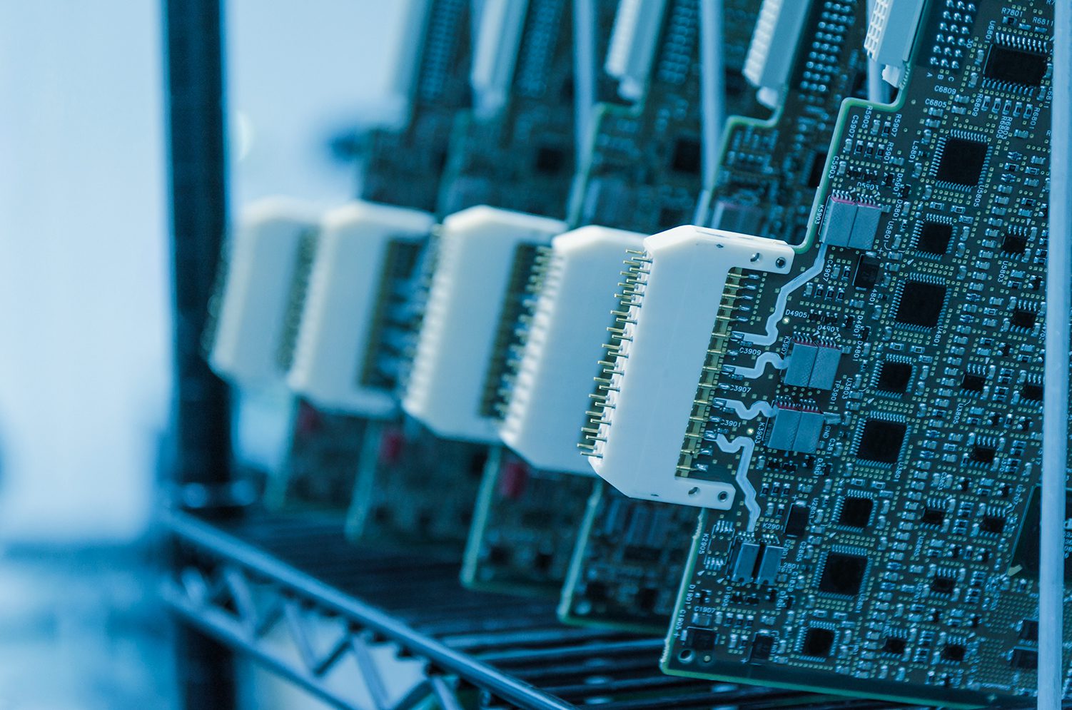 printed circuit boards on shelf
